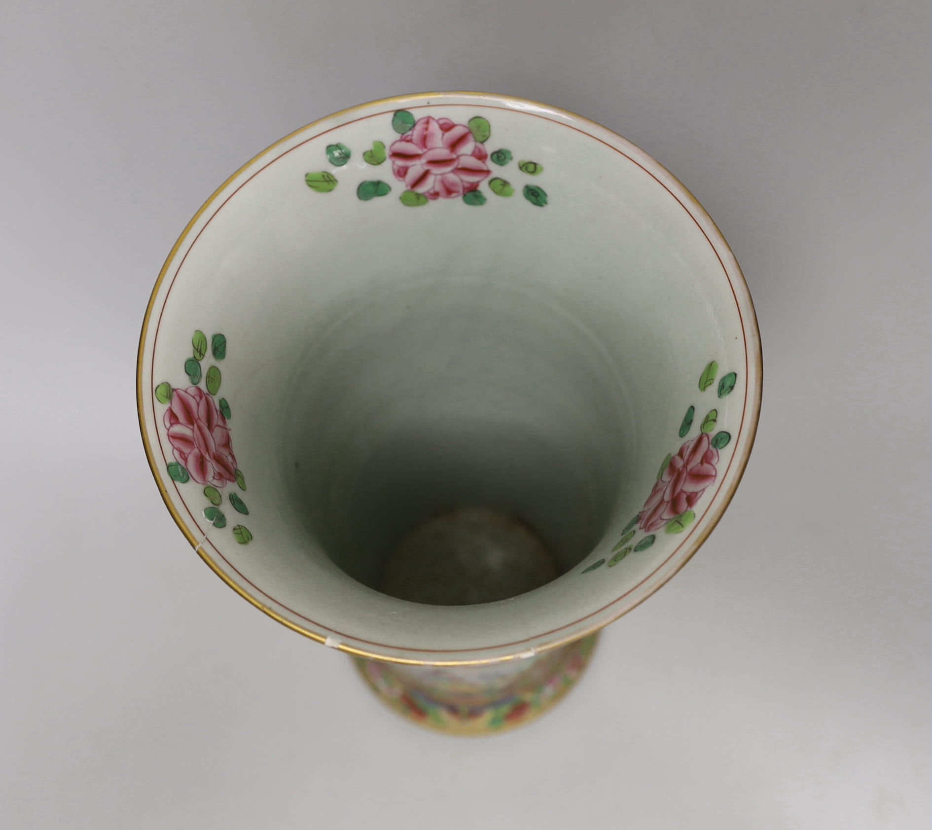 A Chinese Canton decorated famille rose trumpet vase, 33cm high (a.f.)